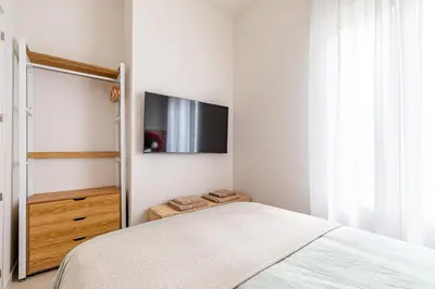 Cama o camas de una habitación en Apartamento para 9 personas en Malasaña