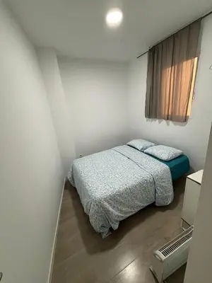 Cama o camas de una habitación en Two-bedroom apartment in Alonso Cano