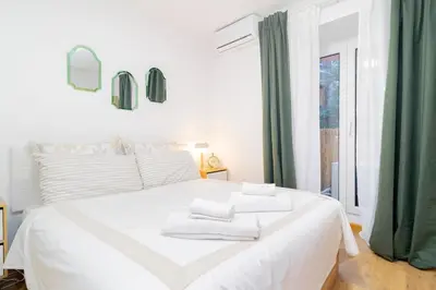 Cama o camas de una habitación en Escondite Sereno en Madrid