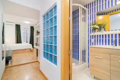 Cama o camas de una habitación en Escondite Sereno en Madrid