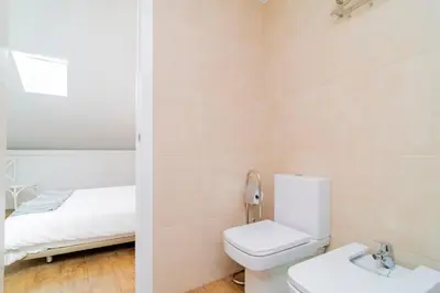 Un baño de Luminoso Atico En lo alto de la ciudad