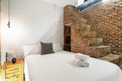 Cama o camas de una habitación en apartamento industrial con 3 alturas en pleno centro de ALQUILER TEMPORAL