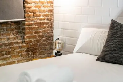 Cama o camas de una habitación en apartamento industrial con 3 alturas en pleno centro de ALQUILER TEMPORAL