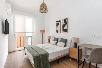 Cama o camas de una habitación en Waou Urban Home Goya - Corta Duración