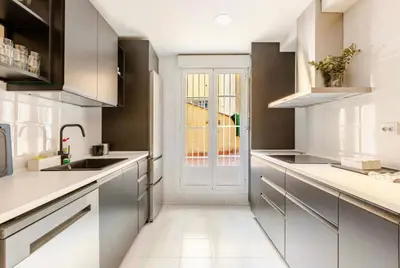 Una cocina o zona de cocina en BookinMadrid - Puerta del Sol - Tirso De Molina