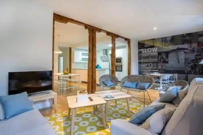 Zona de estar de Slow Suites Luchana