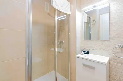 Un baño de Classy XV - Ferga Suites