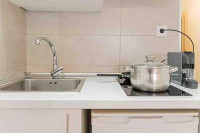 Una cocina o zona de cocina en Classy XV - Ferga Suites