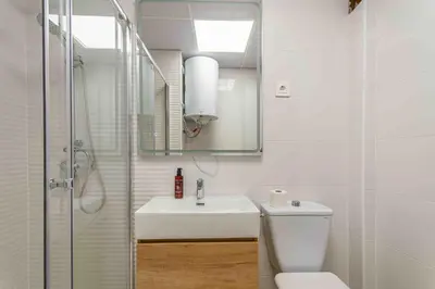 Un baño de Deluxe XII - Ferga Suites