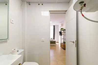Un baño de Deluxe XII - Ferga Suites