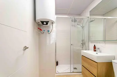 Un baño de Deluxe XII - Ferga Suites