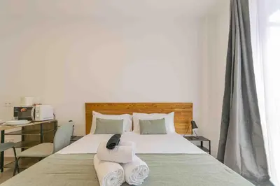Cama o camas de una habitación en Deluxe XII - Ferga Suites