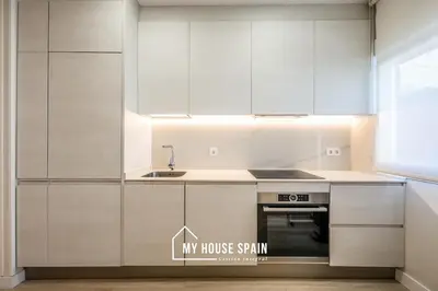 Una cocina o zona de cocina en MyHouseSpain - Luz y Espacio junto al Retiro