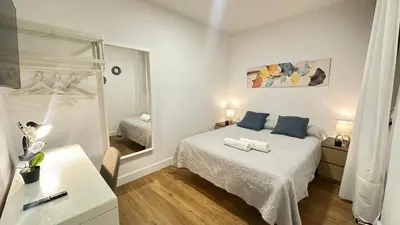 Cama o camas de una habitación en Habitaciones Manuela