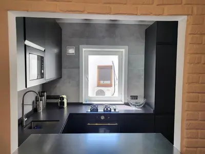 Una cocina o zona de cocina en Lovely Loft Apartment Madrid Center