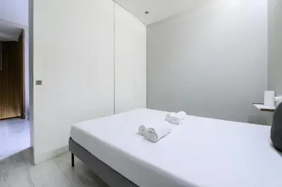 Cama o camas de una habitación en Stylish Stay in the Center of Madrid