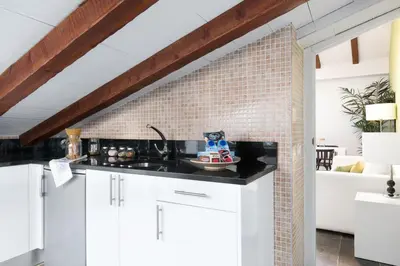 Una cocina o zona de cocina en Carretas Attics Apartments