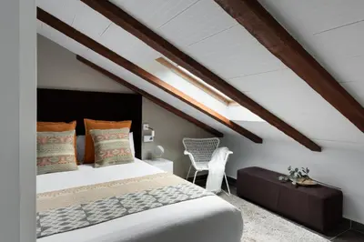 Cama o camas de una habitación en Carretas Attics Apartments