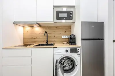 Una cocina o zona de cocina en Modern apartment on Gran Via