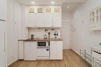 Una cocina o zona de cocina en Refugio Luminoso Junto a Gran Vía