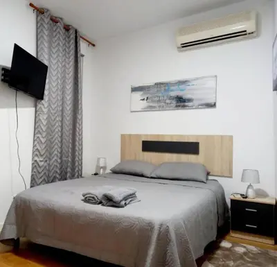 Cama o camas de una habitación en Mundo Pepe Vallecas