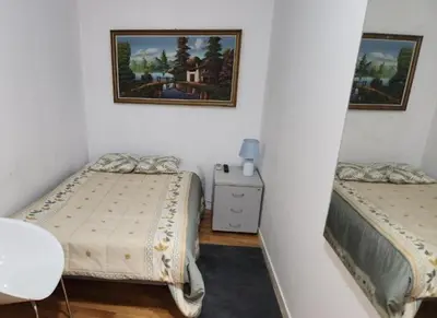 Cama o camas de una habitación en Mundo Pepe Vallecas