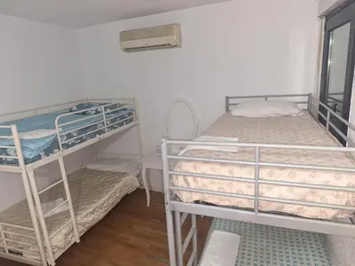 Cama o camas de una habitación en Mundo Pepe Vallecas