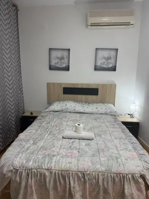 Cama o camas de una habitación en Mundo Pepe Vallecas