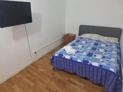 Cama o camas de una habitación en Mundo Pepe Vallecas