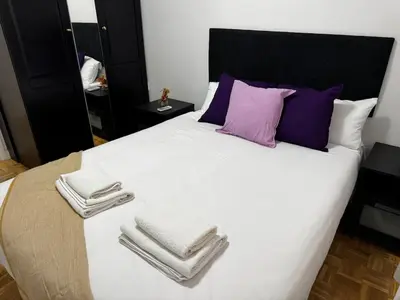 Cama o camas de una habitación en Exyca Homes Retiro