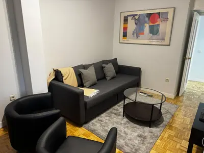 Zona de estar de Exyca Homes Retiro