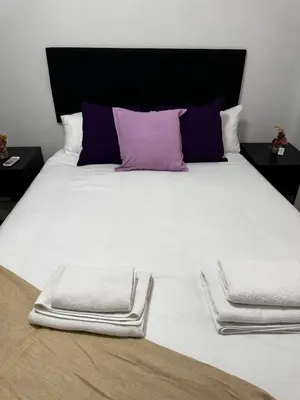 Cama o camas de una habitación en Exyca Homes Retiro