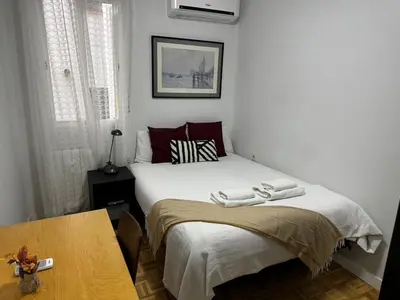 Cama o camas de una habitación en Exyca Homes Retiro