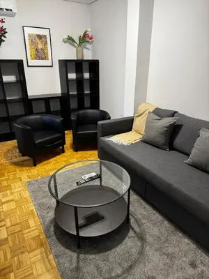 Zona de estar de Exyca Homes Retiro