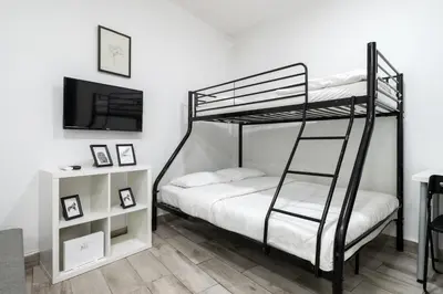 Cama o camas de una habitación en VR20I Estudio Alonso Cano Chamberi