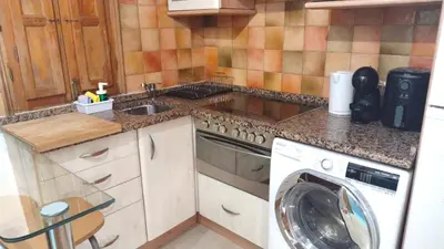 Una cocina o zona de cocina en Acogedor apartamento cerca de Ronda de Atocha