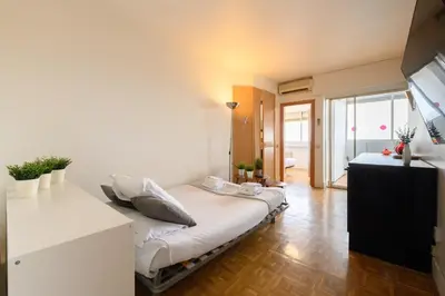 Cama o camas de una habitación en Piso de 2 Dormitorios con Vistas a la Ciudad Confort y Estilo en Madrid Temporal AGPE322