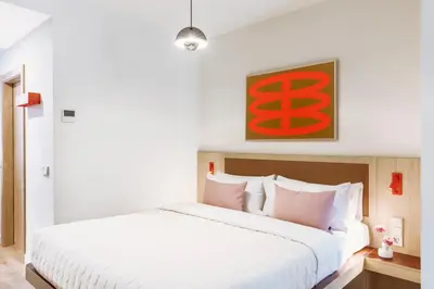 Cama o camas de una habitación en Numa Madrid Fuencarral