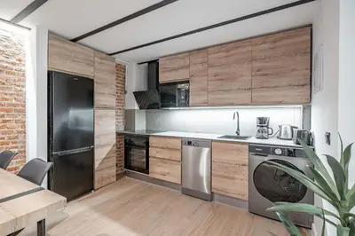 Una cocina o zona de cocina en Apartamento Deluxe Prosperidad
