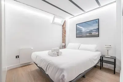 Cama o camas de una habitación en Apartamento Deluxe Prosperidad