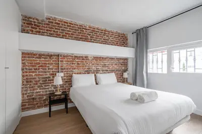 Cama o camas de una habitación en Apartamento Deluxe Prosperidad