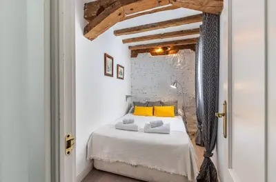 Cama o camas de una habitación en Ático Paseo Del Prado
