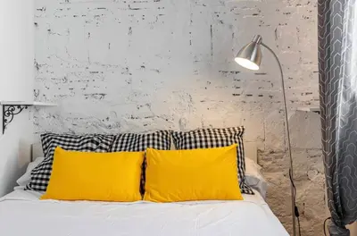 Cama o camas de una habitación en Ático Paseo Del Prado