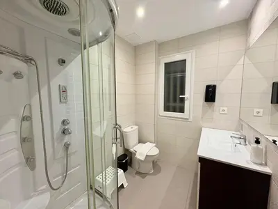 Un baño de Retiro Residence Geranio