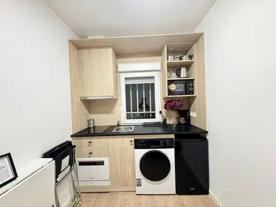Una cocina o zona de cocina en Retiro Residence Geranio