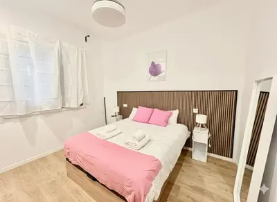 Cama o camas de una habitación en Retiro Residence Tulipán