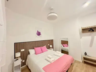 Cama o camas de una habitación en Retiro Residence Tulipán