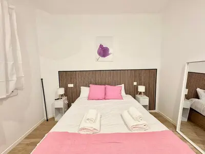 Cama o camas de una habitación en Retiro Residence Tulipán
