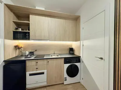 Una cocina o zona de cocina en Retiro Residence Margarita
