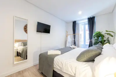 Cama o camas de una habitación en Amati Boutique Coliving Madrid